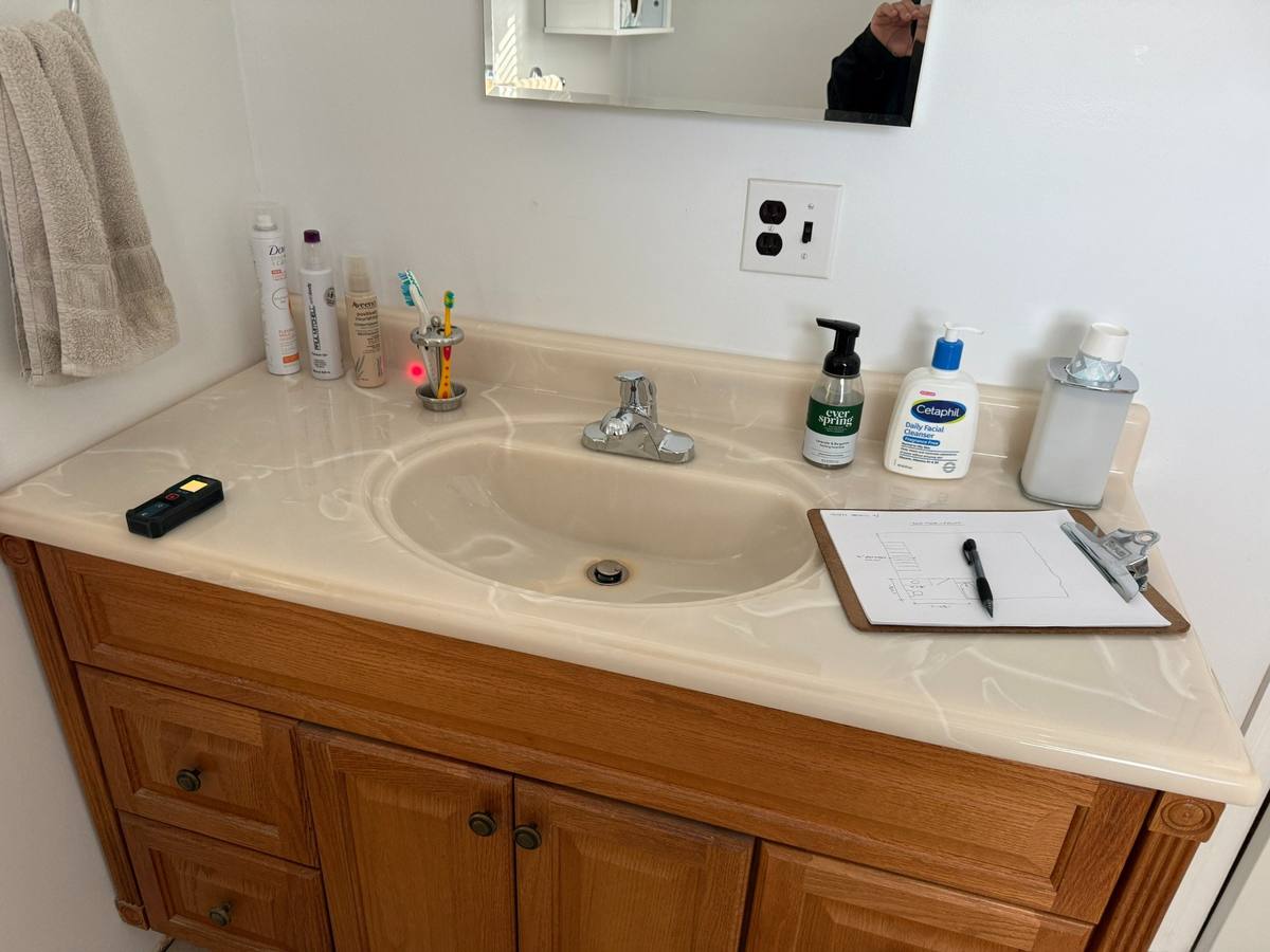 Existing bathroom vanity before the proposed primary suite addition