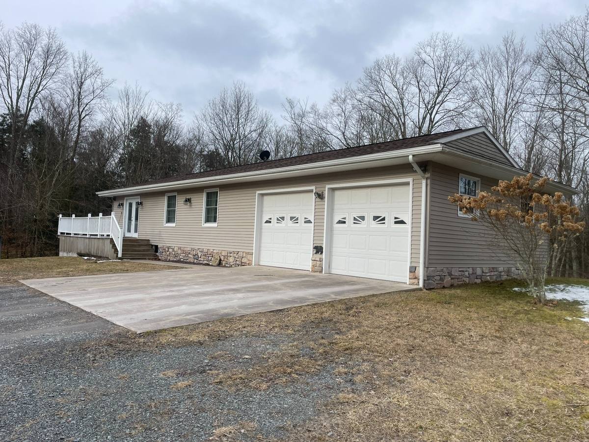 Existing front garage approach of the Residence before the proposed rebuild