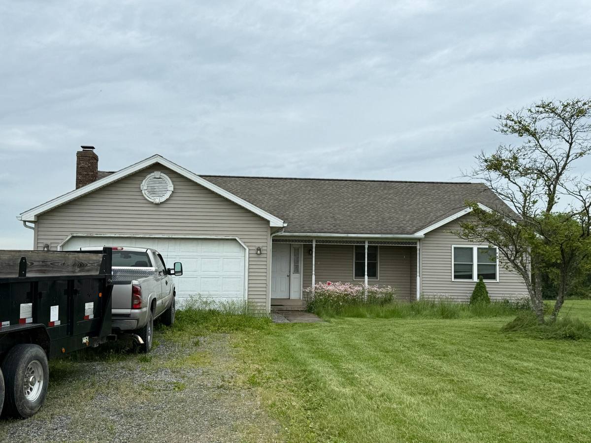 Existing front exterior before the renovation and addition design