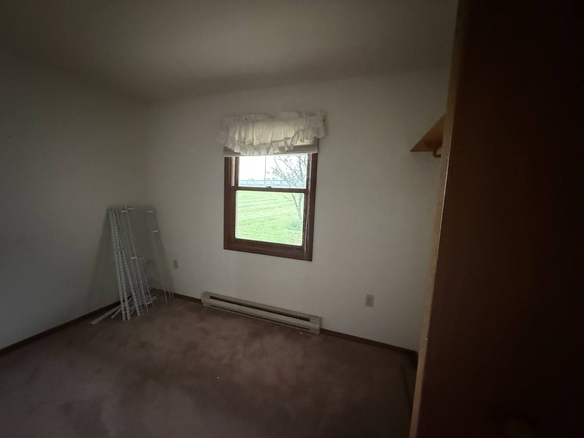 Small existing bedroom before proposed improvements